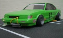 Green Nissan Leopard scale model